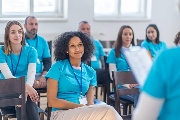 istock Volunteers listening to a presentation during a briefing 2241900433
