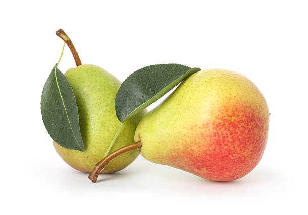 A close-up shot of a rustic wicker basket filled with fresh fruits, including apples and pomegranates, adorned with dewdrops. The basket is set against a warm, wooden background, giving the image a cozy, autumnal feel. Perfect for use in food, rustic lifestyle, and seasonal-themed advertising or editorial projects