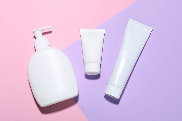 istock Cosmetic products on color background, flat lay. Mockup for design 2241901870