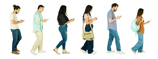 istock People walking and using cell phones in a white background 2241902988