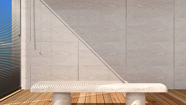 istock bench in sunlight from sliding door partition, blank white wall with baseboard. Luxury interior design decoration, fashion, beauty, product display 2241909849