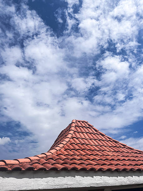 istock Geometric roof lines under soft cloudy sky 2241914055