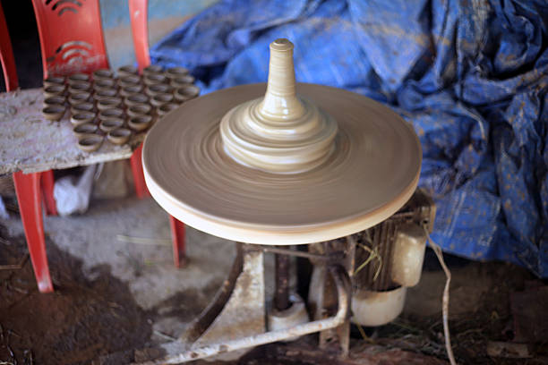 The spinning motor-operated potter's wheel ('Chakra') used by artisans to create clay utensils for festivals like Tihar in Inaruwa-4.