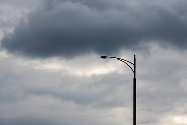 istock streetlight against the overcast sky 2241933780