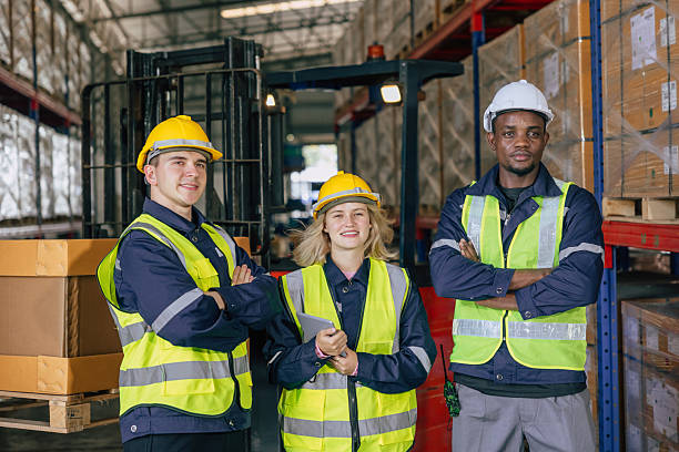 istock staff team warehouse workers. professional factory cargo storage worker. stock inventory staff 2241934207