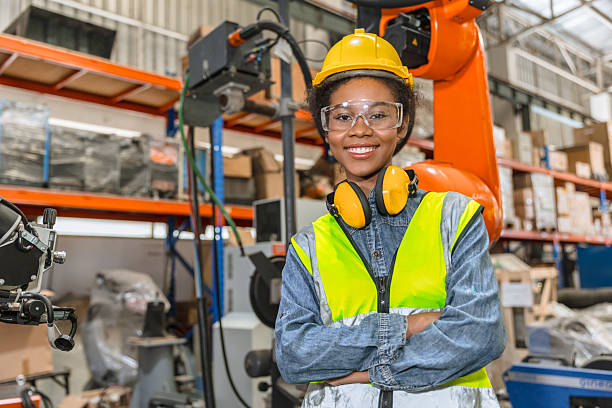 istock professional engineer, robotic technician work in modern factory industrial robot welding arm machine control operator 2241934214
