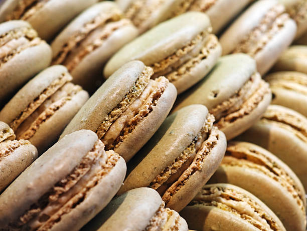 istock close up of rows of beige macaron 2241938587