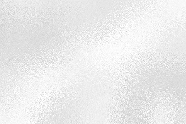 istock White Gray or silver foil frosted glass effect texture background. Abstract gradient bright light reflection and shiny rough texture surface 2241942264