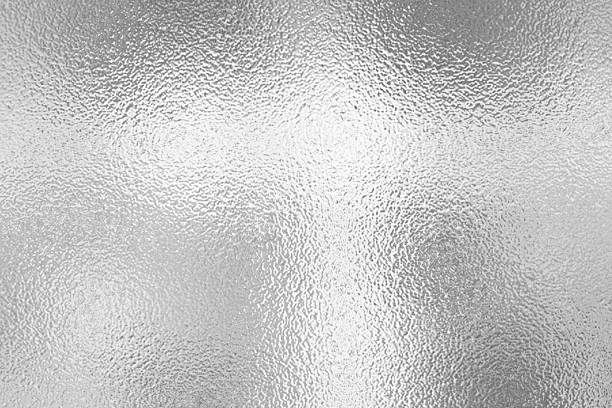 Gray or silver foil frosted glass effect texture background. Abstract gradient bright light reflection and shiny rough texture surface. Illustration effect background
