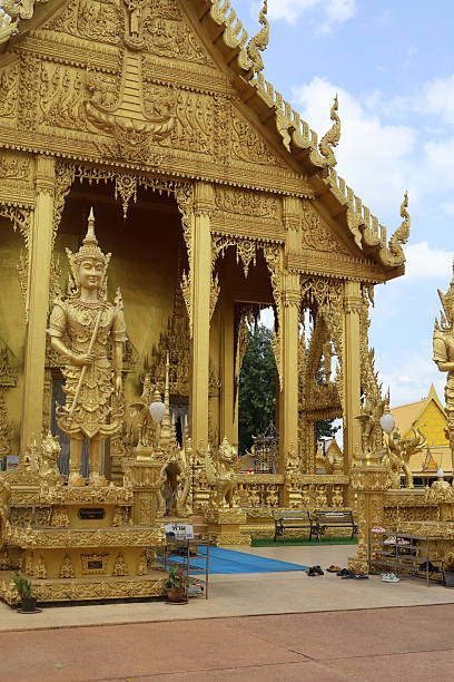 istock Ancient architectural structure, ornate golden design featuring intricate carvings, sunny day, perfect for travel themes. 2241948163