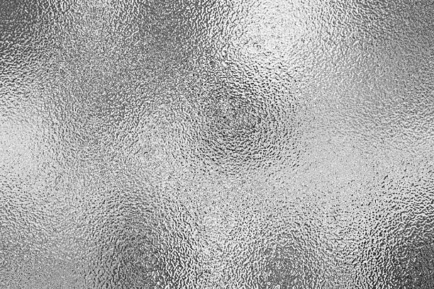 istock Shiny Silver Rough Textured Metallic Foil Background 2241948230