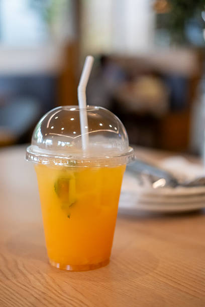 Orange juice on the wooden table