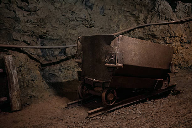 old  minecart  in underground mine and ore