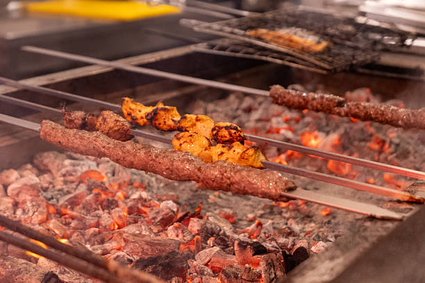 istock Grilled Chicken Skewers Cooking Over Hot Charcoal Fire 2241955633
