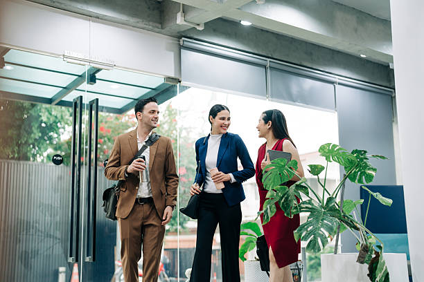 istock Diverse group of professionals arriving for work 2241958369