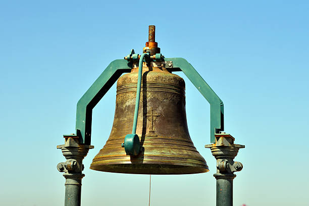 bell that sits atop the Rua Augusta Arch in Lisbon, Portugal