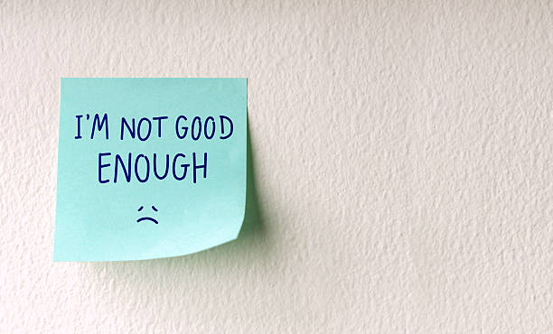 istock Mind, Mental Health and Self Talk Concepts. a Sticky Note with the Negative Word, Fixed Mindset 2241966458