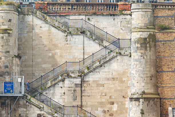 Folkestone, Kent ,uk August 1,  2023 Historic Stone Staircase Exterior Wall With Metal Railings And A Single Pedestrian