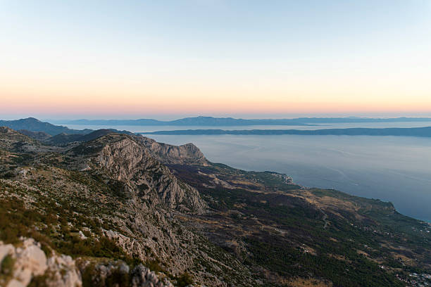Mountain view over sea at sunset in Croatia