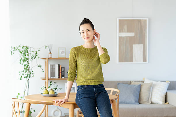 istock Young woman relaxing at home 2241985439