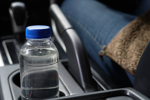 istock Drinking water in the car prepared for traveling 2241987745
