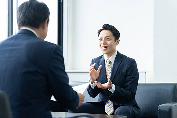 istock Middle-aged businessman negotiating 2241988640