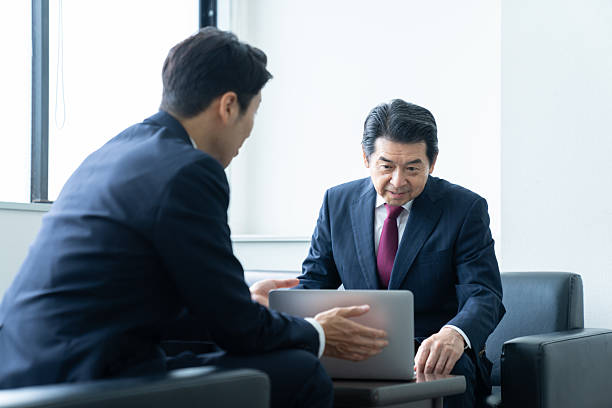 istock Senior businessman negotiating 2241988760