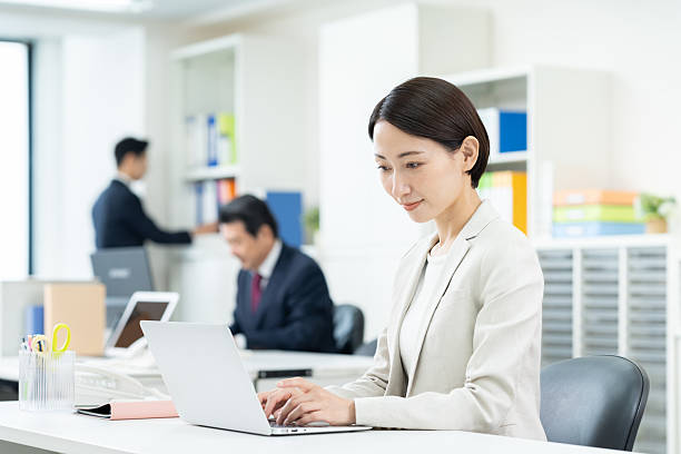 istock Middle-aged businesswoman working in the office 2241989623