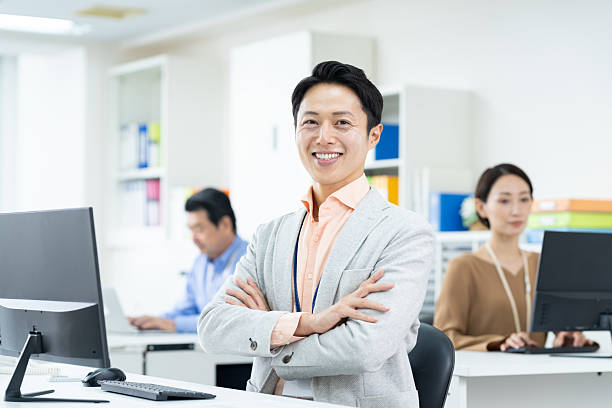 istock Middle-aged businessman working in the office 2241989801