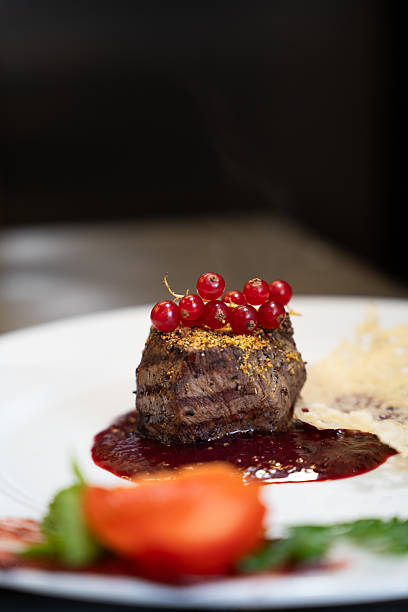 istock Grilled Meat Fillet with Berry Sauce 2241994159