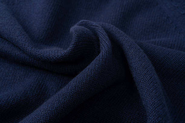 istock Navy blue merino wool sweater texture as background. Top view. 2241996696