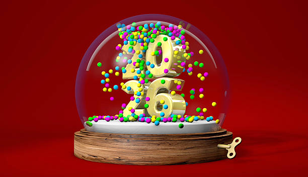 As a gold year spins inside a miniature snow globe, sugar snow falls on it, bringing abundance in new year. / You can see the animation movie of this image from my iStock video portfolio. Video number: 2241996884