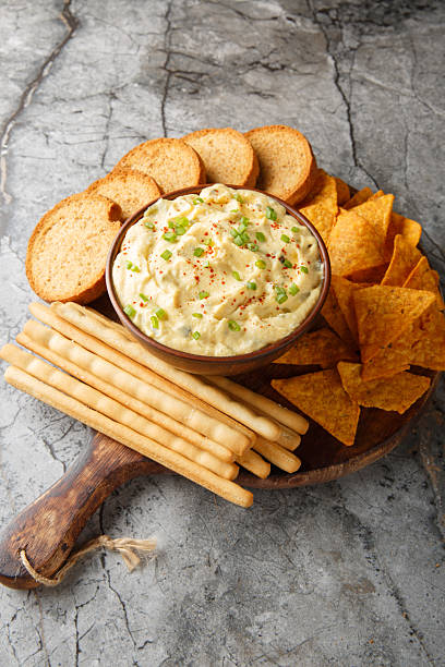 istock creamy, punchy egg dip that really tastes just like a deviled egg with bread close-up in a plate. Vertical 2242000266