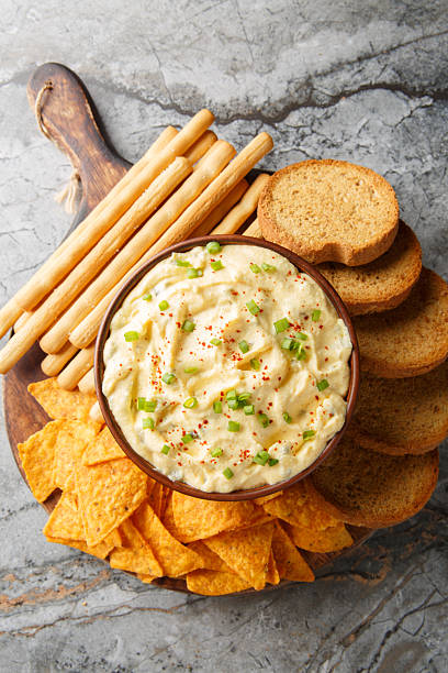 istock creamy, punchy egg dip that really tastes just like a deviled egg with bread close-up in a plate. Vertical top view 2242000374