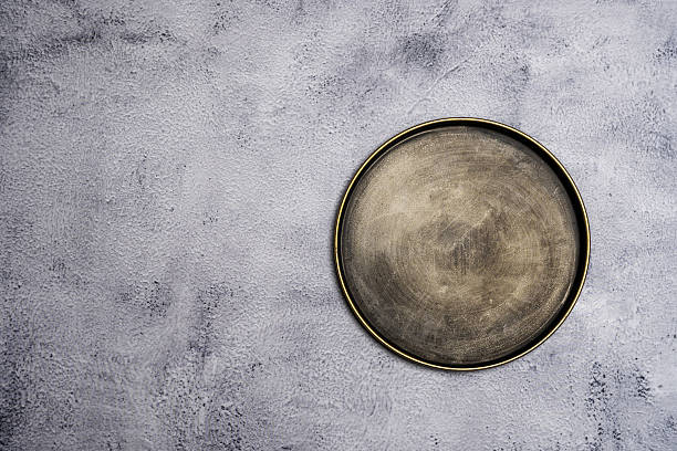 istock A vintage metal plate with a gold edge 2242004191