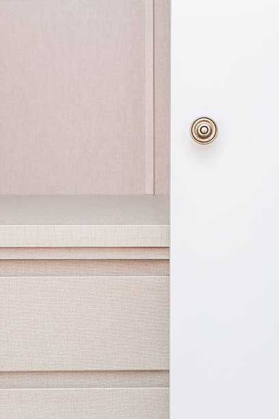 istock Architectural jewelry: premium chrome handle with straight-line design enhancing white lacquered door 2242007334