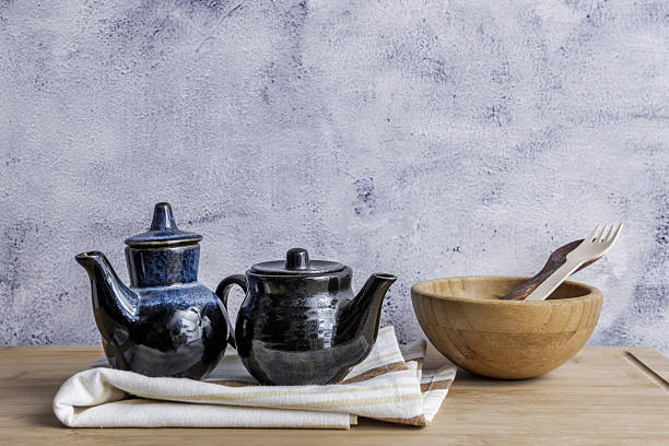 Set of antique Chinese Tea pot cup isolated on white background. Vintage porcelain Japanese teapot with teacup on white table, Asian drink lifestyle concept. China coffee mug, top view