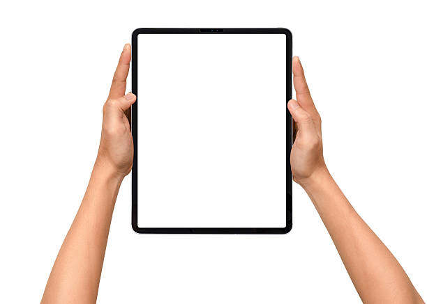 istock Close-up of hands holding a modern tablet with blank screen isolated on white background. High quality studio shot. Concept for technology, business, finance, advertising and public relations. 2242017565