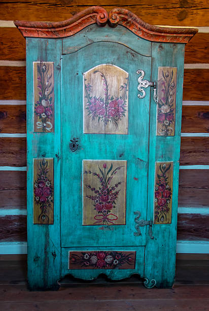 An old painted cabinet in a village house, empire style