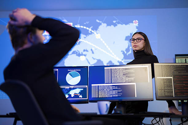istock Cybersecurity analysts monitoring threats in a security operations center environment 2242019924