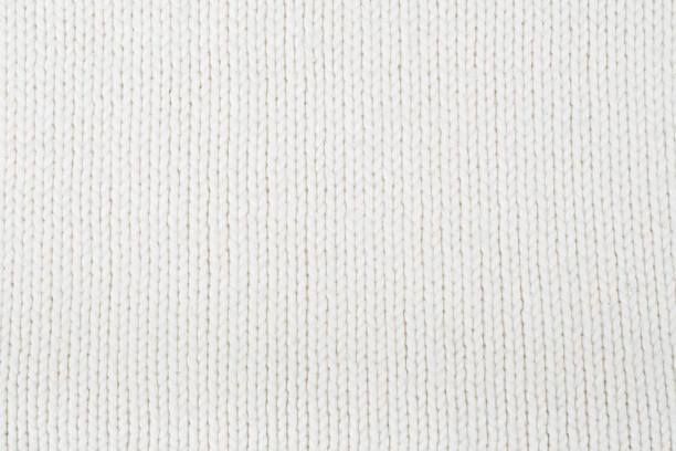 istock Sweater or scarf fabric texture large knitting. Knitted jersey background with a relief pattern. Wool hand- machine, handmade. 2242024045