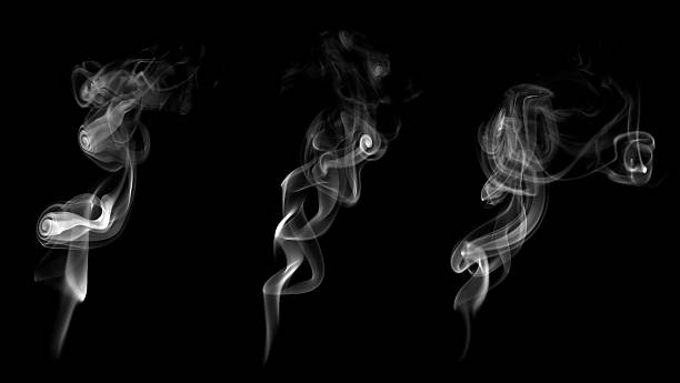 Abstract white smoke swirling on black background, creating elegant motion and soft vapor texture. Perfect for visual effects, meditation themes, digital art, or background design projects.
