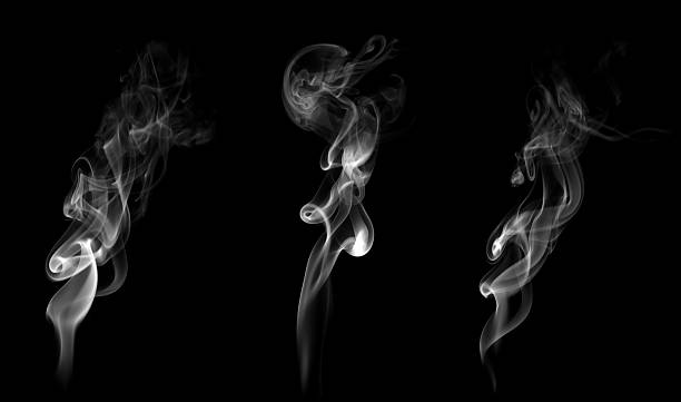 istock Abstract white smoke rising on black background, showing fluid motion and soft texture. Ideal for visual effects, digital art, meditation themes, or design projects about mystery and atmosphere. 2242025283