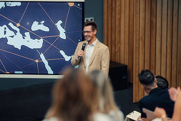 istock Speaker presenting global business network at conference 2242027495