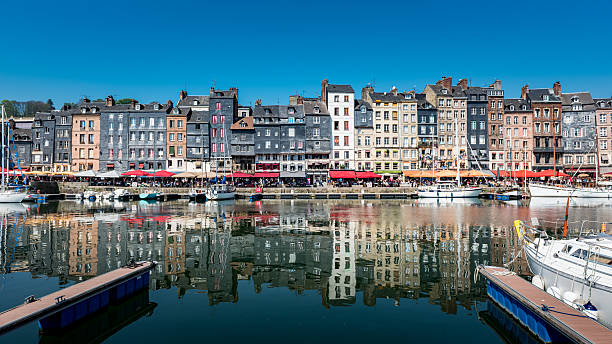 istock Old harbor of Honfleur, with reflection on the water 2242027888