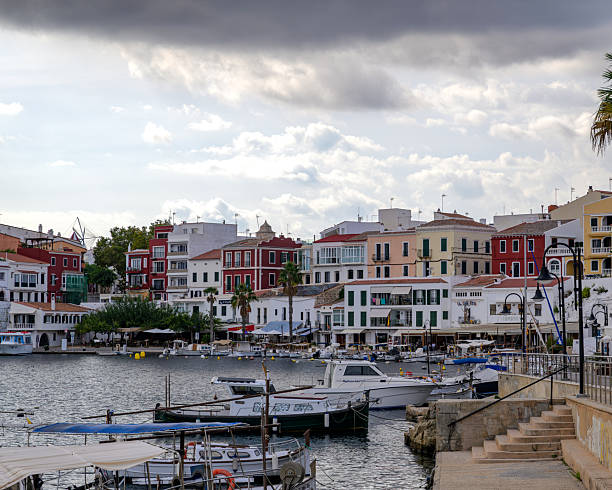 istock Colorful waterfront buildings in Es Castell harbor, Menorca 2242028241