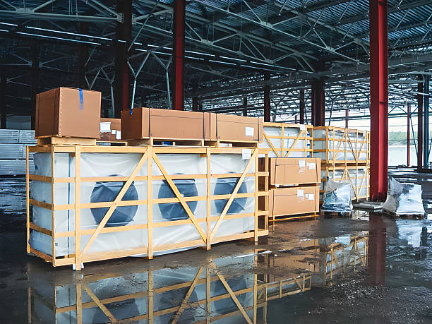 istock Warehouse scene with packaged goods ready for shipment. 2242030053