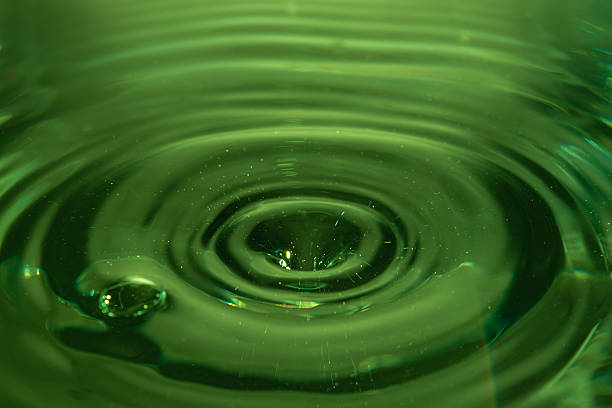 istock 321.Green Liquid Ripple from Droplet Impact Center 2242036266
