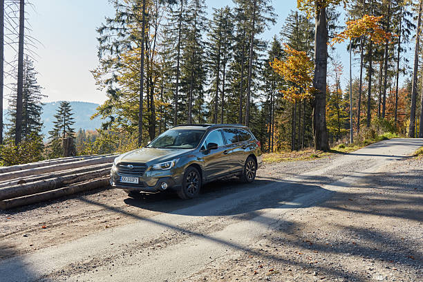 Subaru Outback with permanent all-wheel drive on the mountain roads. Model 2019, 175 hp engine. Wisla, Poland - 10.13.2019