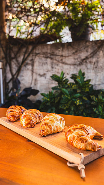istock Rustic Croissant Selection on Wooden Board 2242052377